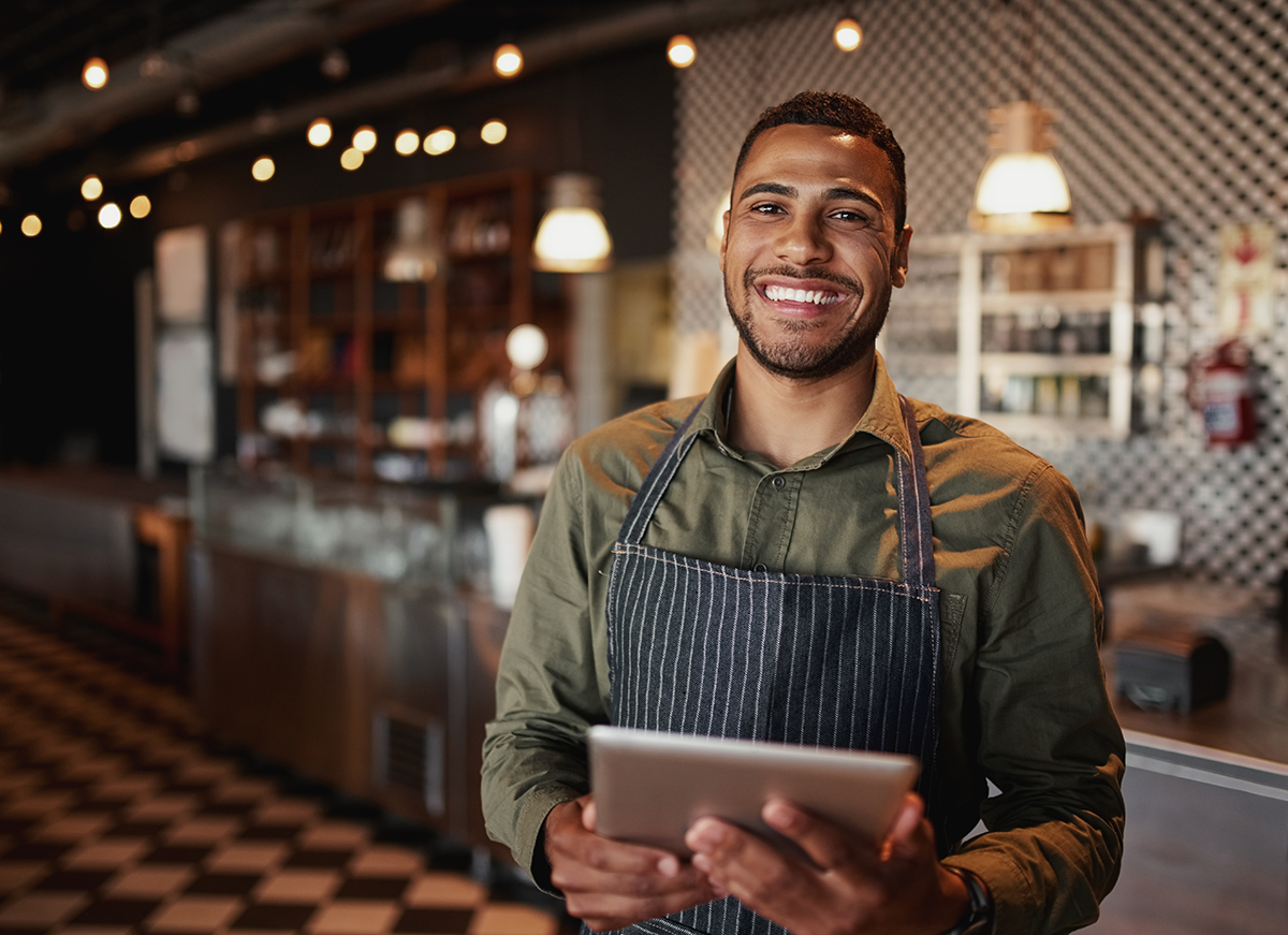 iPad point of sale happy restaurant owner